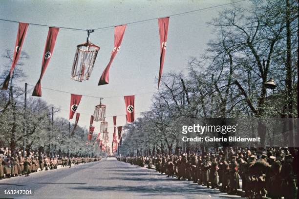Street in the Tiergarten lined by police and SA forces. 1st May 1937. At the Lustgarten, Adolf Hitler , chancellor of Germany, delivered a speech in...