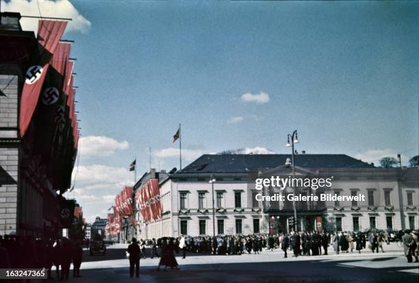 Buildings are decorated with swastika flags in the downtown area near the Lustgarten, where Adolf Hitler , chancellor of Germany, delivered a speech...