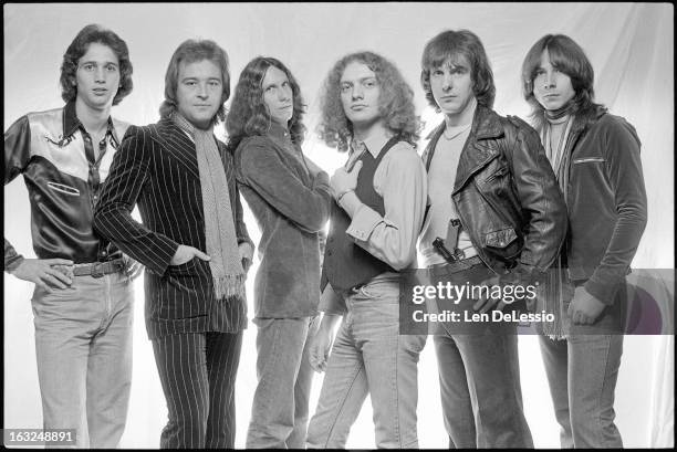 Portrait of British & American rock band Foreigner as they pose in the photographer's studio, New York, New York, 1976. Left to Right: Ed Gagliardi,...