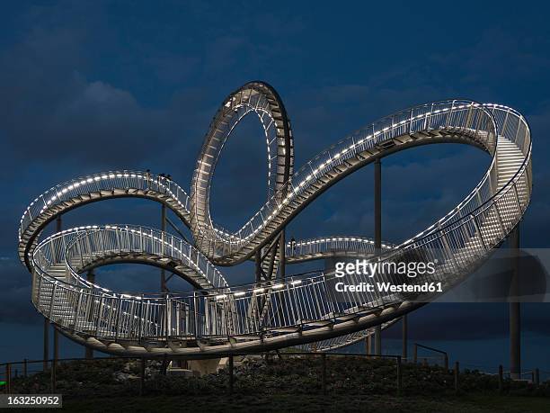 germany, duisburg, view of tiger and turtle art installation at angerpark - duisburg stock pictures, royalty-free photos & images