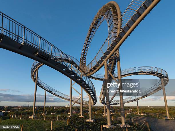 germany, duisburg, view of tiger and turtle art installation at angerpark - duisburg stock pictures, royalty-free photos & images