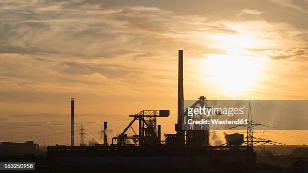 germany, north rhine westphalia, duisburg, view of smelting plant - steel factory stock pictures, royalty-free photos & images