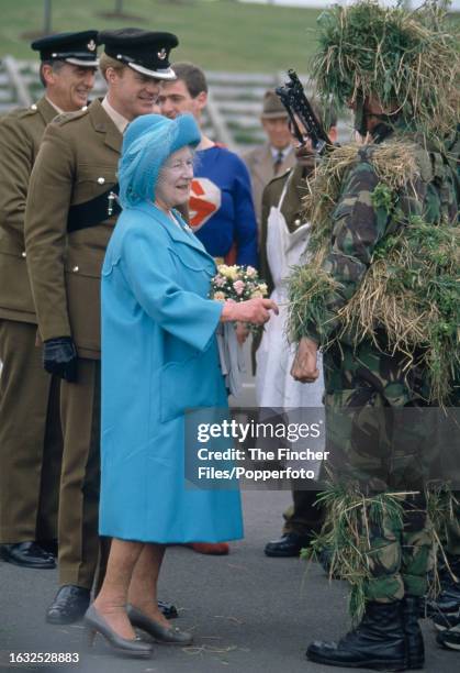 Queen Elizabeth The Queen Mother in Wakefield, West Yorkshire, inspecting troops whilst presenting new colours to the Light Infantry on 15th July...