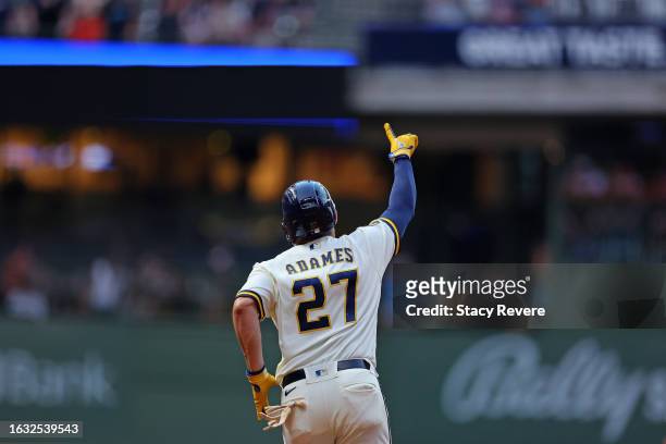 Willy Adames of the Milwaukee Brewers celebrates a two run home run against the Minnesota Twins during the first inning at American Family Field on...