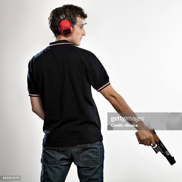 target shooting athlete - pistool stockfoto's en -beelden