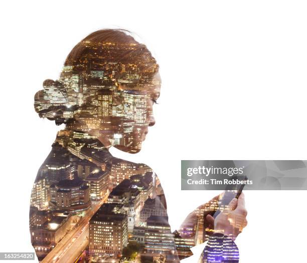 business woman using a phone, and night city view - mehrfachbelichtung stock-fotos und bilder