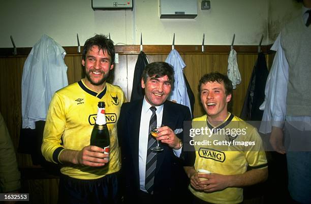 Portrait of Oxford United Manager Maurice Evans flanked by Jeremy Charles and Les Phillips after the Milk Cup semi-final Second Leg against Aston...