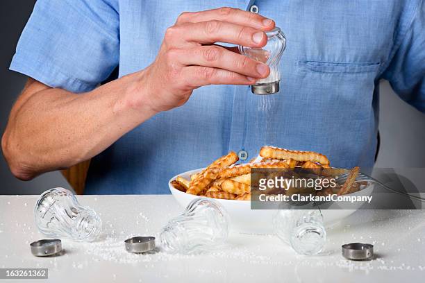 too much salt - salt cellar stock pictures, royalty-free photos & images