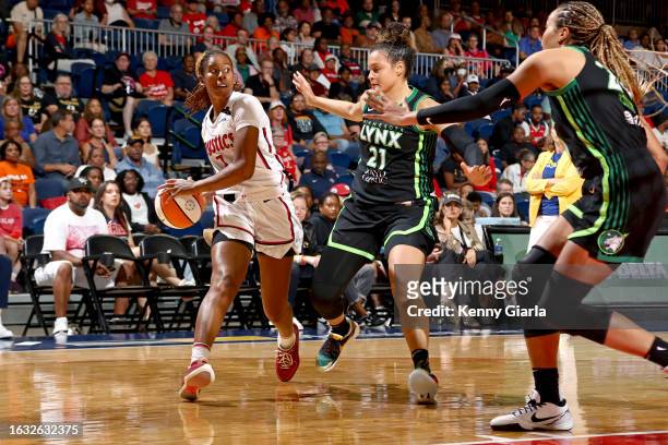 Ariel Atkins of the Washington Mystics handles the ball during the game against the Minnesota Lynx on August 29, 2023 at Entertainment & Sports Arena...