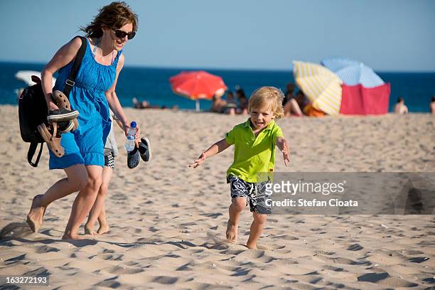 summer fun | albufeira beach, portugal - albufeira stock pictures, royalty-free photos & images