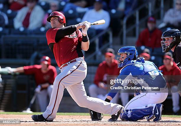 Rod Barajas of the Arizona Diamondbacks bats against the Kansas City Royals during the spring training game at Surprise Stadium on February 25, 2013...