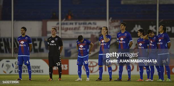 Argentina's Tigre football team pay homage to late Uruguayan footballer Luis Cubilla before their Copa Libertadores 2013 Group 2 football match...