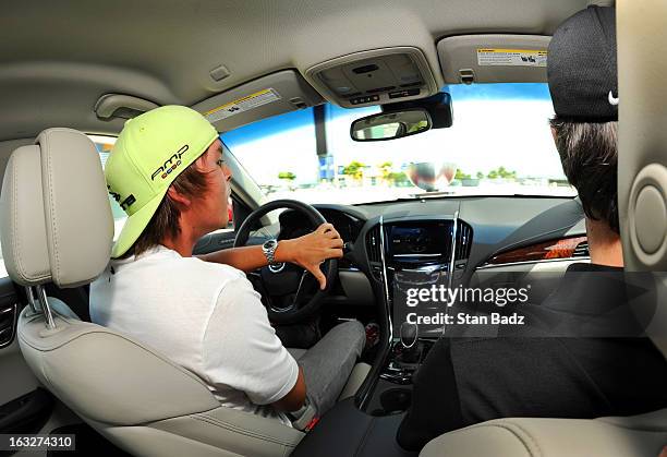 Rickie Fowler competes in a timed-driving skills test at the Homestead-Miami Speedway as part of The Cadillac Driving Experience held before the...