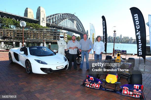 The Stig, Shane Jacobson, Jeremy Clarkson and James May pose at Campbell's Cove Boardwalk ahead of the Inaugural Top Gear Festival Sydney this...