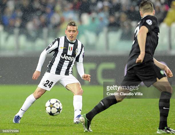 Emanuele Giaccherini of Juventus in action during the Champions League round of 16 second leg match between Juventus and Celtic at Juventus Arena on...