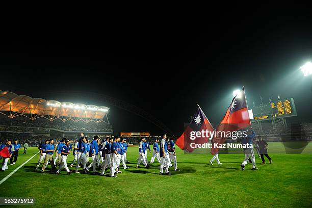 Members of Chinese Taipei thank fans after advancing to the second round of the 2013 World Baseball Classic after Pool B, Game 6 between Team Chinese...