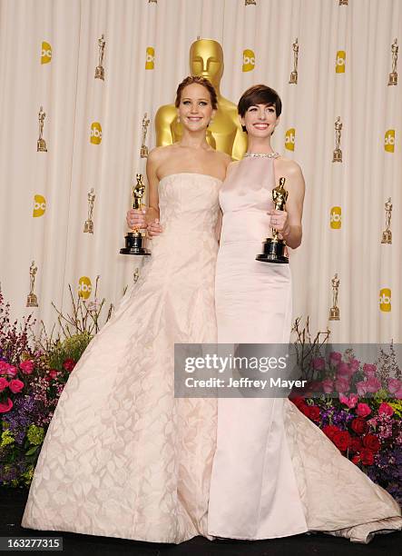 Jennifer Lawrence and Anne Hathaway pose in the press room the 85th Annual Academy Awards at Dolby Theatre on February 24, 2013 in Hollywood,...