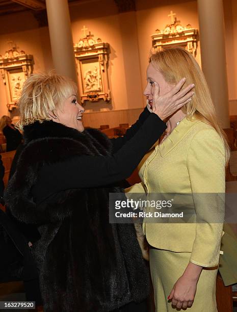 Lorrie Morgan and Tristan White attend the memorial service for Mindy McCready at Cathedral of the Incarnation on March 6, 2013 in Nashville,...
