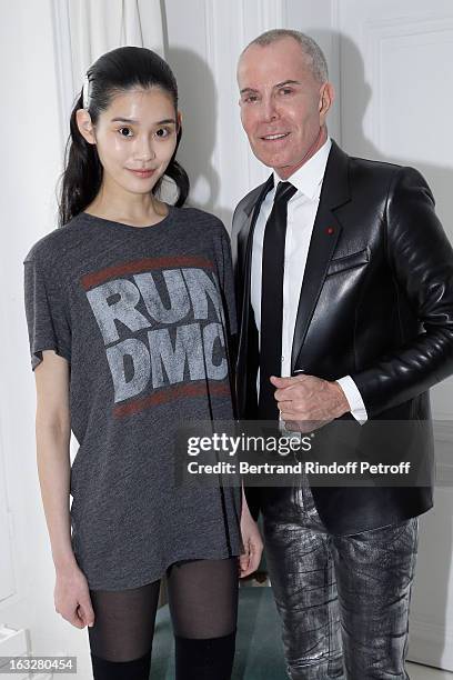 Jean-Claude Jitrois and Ming Xi pose prior to the Jitrois Fall/Winter 2013 Ready-to-Wear show as part of Paris Fashion Week on March 6, 2013 in...