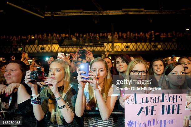 Music fans in the front row watch on as Lawson perform during a sold out show on their Chapman Square Tour at Rock City on March 6, 2013 in...