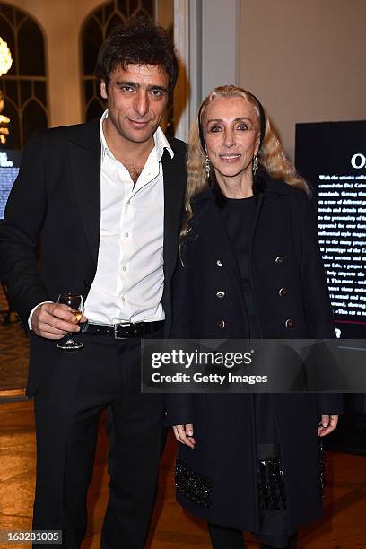 Adriano Giannini and Franca Sozzani, Vogue Italia Editor in Chief, attend the charity auctioning of the first "Citroen DS3 Cabrio L'Uomo Vogue"...