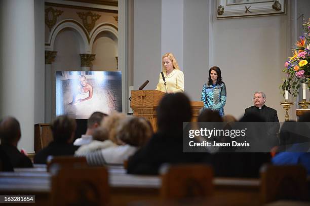 Cousin Tristan White, Family Friend Ashley Webb and Reverend Edward F. Steiner attend the memorial service for Mindy McCready at Cathedral of the...