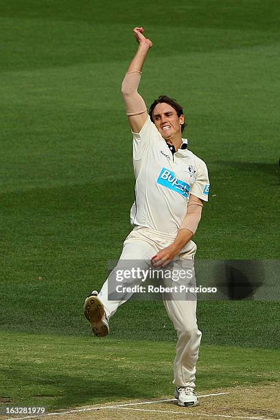 Will Sheridan of the Bushrangers bowls during day one of the Sheffield Shield match between the Victorian Bushrangers and the New South Wales Blues...