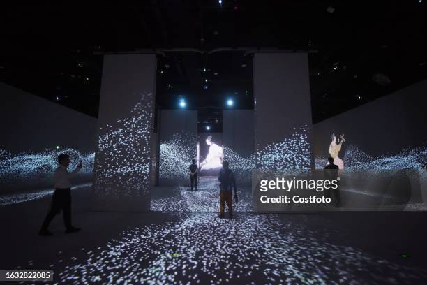 Visitors interact at the digital exhibition hall of the new Zhejiang Museum in Hangzhou, Zhejiang province, China, August 29, 2023. It is understood...