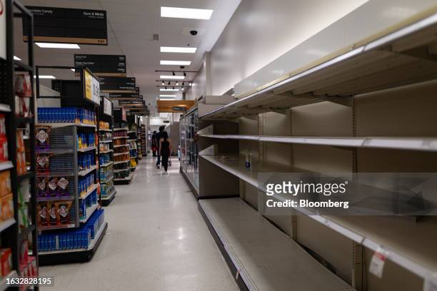 Shelves left empty at a Target store ahead of Hurricane Idalia in Gainesville, Florida, US, on Tuesday, Aug. 29, 2023. Hurricane Idalia is building...