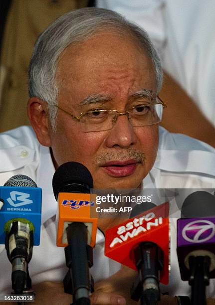 Malaysia's Prime Minister Najib Razak speaks during a press conference in Felda Sahabat in Lahad Datu on March 7, 2013 concerning the situation in...