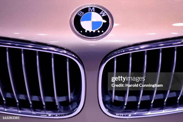 The BMW logo is seen during the 83rd Geneva Motor Show on March 6, 2013 in Geneva, Switzerland. Held annually with more than 130 product premiers...