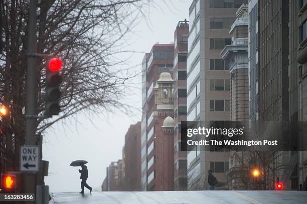 The weather in Downtown Washington, D.C. Continues to alternate between rain and snowflakes on and off this morning in Washington, D.C. On March 06,...