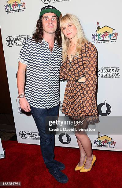 Musicians Sam Martin and Alice Katz of the band Youngblood Hawke attend the 7th Annual "Stars & Strikes" Celebrity Bowling and Poker Tournament...