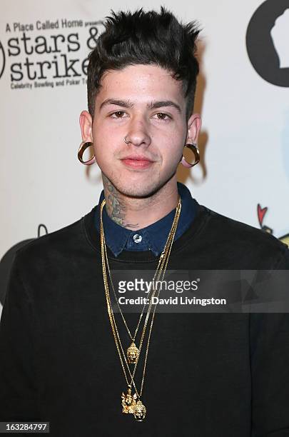 Recording artist T. Mills attends the 7th Annual "Stars & Strikes" Celebrity Bowling and Poker Tournament benefiting A Place Called Home at PINZ...