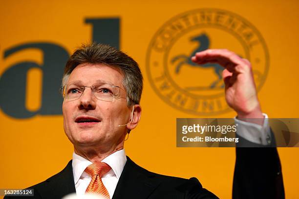 Elmar Degenhart, chief executive officer of Continental AG, gestures whilst speaking during a news conference to announce earnings in Frankfurt,...