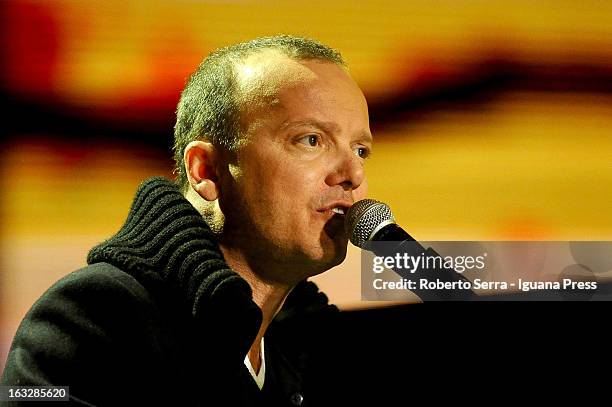 Italian musician and author Gigi D'Alessio performs the Lucio Dalla Tribute at Piazza Maggiore on March 4, 2013 in Bologna, Italy.