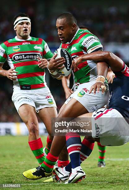 Roy Asotasi of the Rabbitohs is tackled during the round one NRL match between the Sydney Roosters and the South Sydney Rabbitohs at Allianz Stadium...