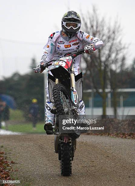 Motocross World Champion Kiara Fontanesi drive her motorbike during a visit to Parma FC at the club's training ground on March 6, 2013 in Collecchio,...