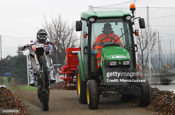 Motocross World Champion Kiara Fontanesi drive her motorbike during a visit to Parma FC at the club's training ground on March 6, 2013 in Collecchio,...