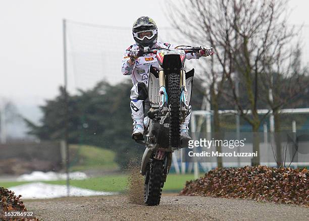 Motocross World Champion Kiara Fontanesi drive her motorbike during a visit to Parma FC at the club's training ground on March 6, 2013 in Collecchio,...