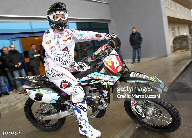 Motocross World Champion Kiara Fontanesi drive her motorbike during a visit to Parma FC at the club's training ground on March 6, 2013 in Collecchio,...