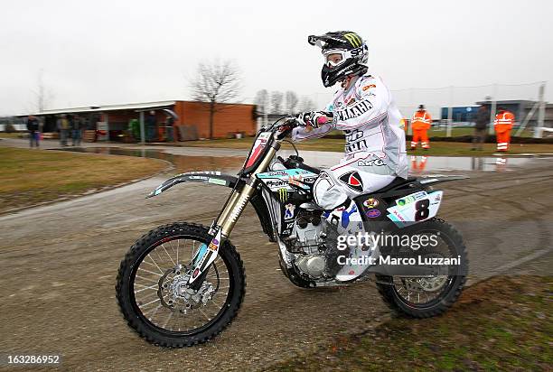 Motocross World Champion Kiara Fontanesi drive her motorbike during a visit to Parma FC at the club's training ground on March 6, 2013 in Collecchio,...