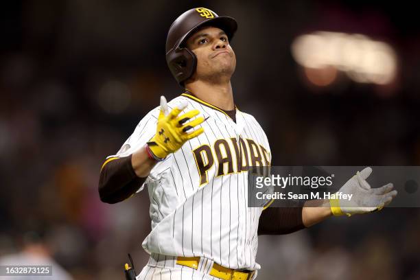 Juan Soto of the San Diego Padres reacts after flying out during the ninth inning of a game against the Miami Marlins at PETCO Park on August 22,...