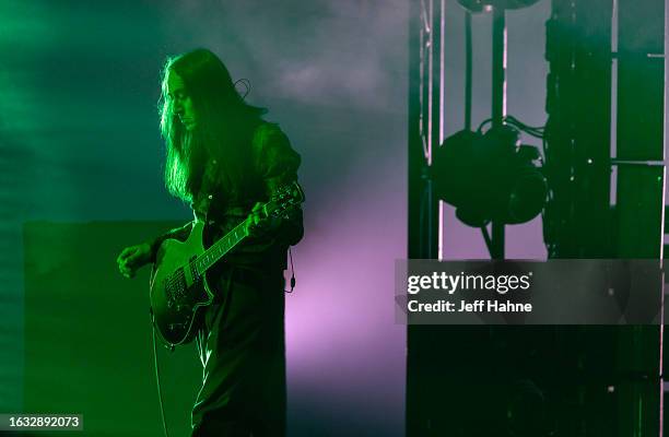 Guitarist Jeff Schroeder of Smashing Pumpkins performs at PNC Music Pavilion on August 22, 2023 in Charlotte, North Carolina.