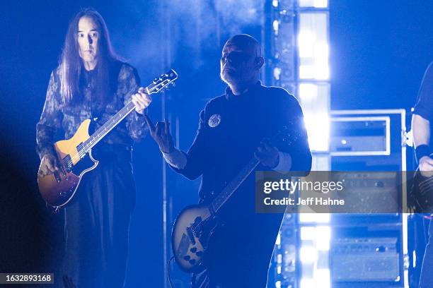 Guitarist Jeff Schroeder and singer/guitarist Billy Corgan of Smashing Pumpkins perform at PNC Music Pavilion on August 22, 2023 in Charlotte, North...