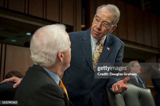 Sen. John Cornyn, R-TX., and Sen. Charles "Chuck" Grassley, R-IA, talk before the start of the Senate Judiciary Committee markup of S.150, the...
