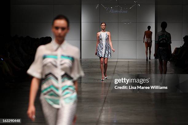 Models showcase designs by Nicola Finetti on the runway during Fashion Palette 2013 on March 7, 2013 in Sydney, Australia.