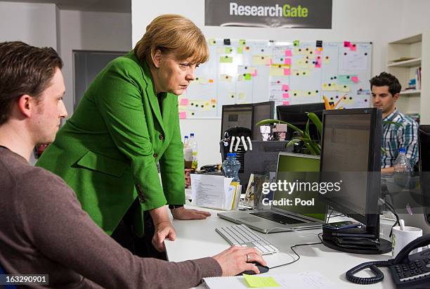 German Chancellor Angela Merkel visits the company Research Gate on March 7, 2013 in Berlin, Germany. Chancellor Merkel and Economy Minister Philipp...