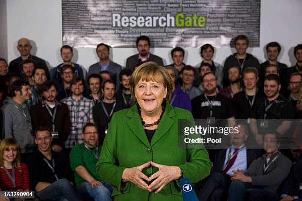 German Chancellor Angela Merkel visits the company Research Gate on March 7, 2013 in Berlin, Germany. Chancellor Merkel and Economy Minister Philipp...