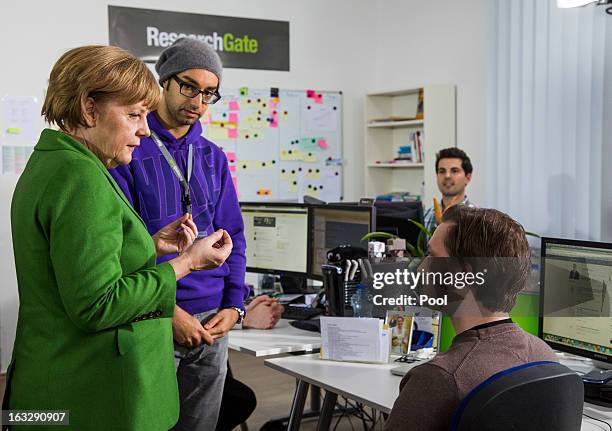 German Chancellor Angela Merkel visits the company Research Gate on March 7, 2013 in Berlin, Germany. Chancellor Merkel and Economy Minister Philipp...